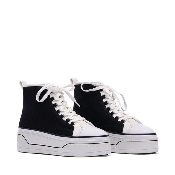 D'Amelio Footwear | Stand Out with The Eyekonn Sneaker - Black & White Canvas/Soft Nappu PU 6.5