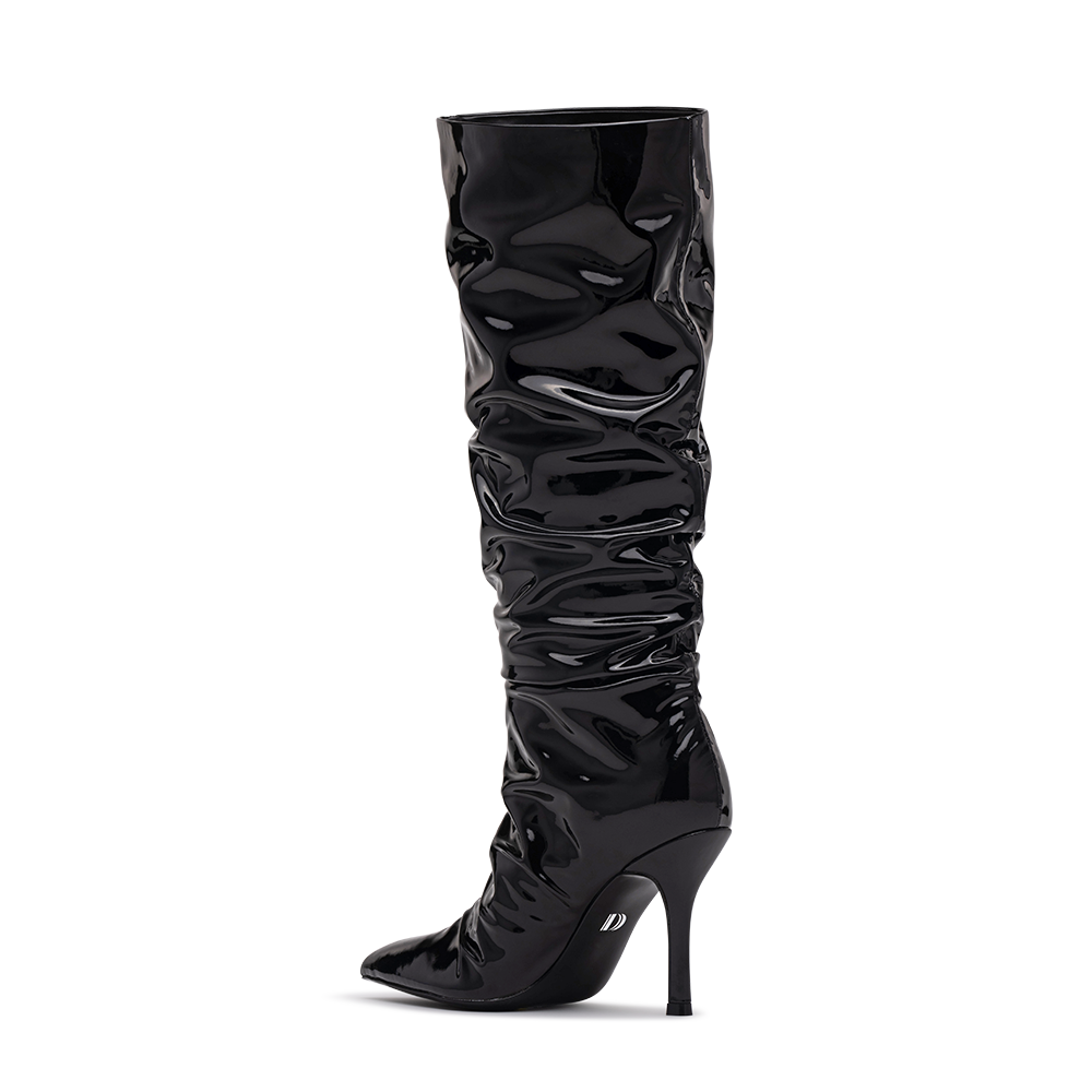 3/4 Back Side View Product Image of the Cristean Heeled Boot in Black Patent