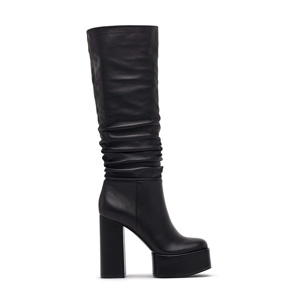 Side View of the Rosela Slouch Platform Heeled Boots in Black